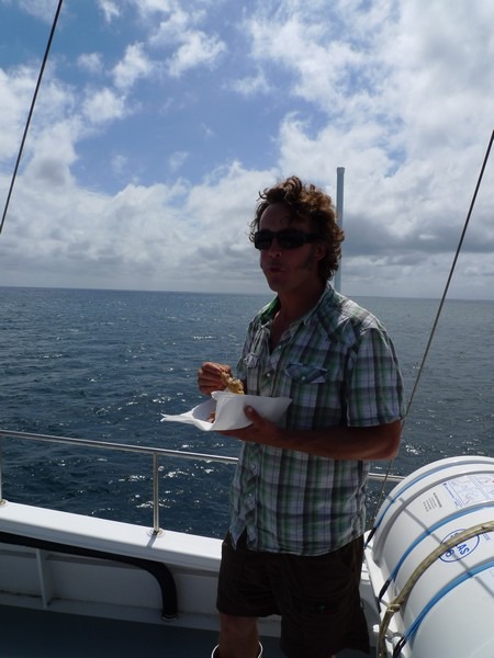 Charlie enjoying some free time and a feed on the top deck of the boat. Te Papa, photograph by Vincent Zintzen