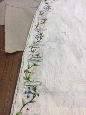 Once the embroidery was completed, Alison had to cut the panels and complete the button holes. Photo courtesy of Alison Larkin.