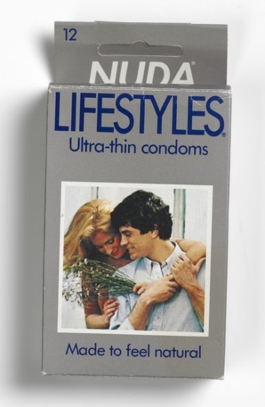 Box of Nuda Lifestyles Ultra-thin condoms featuring photograph of a young couple on the front. The woman is holding a bunch of flowers.