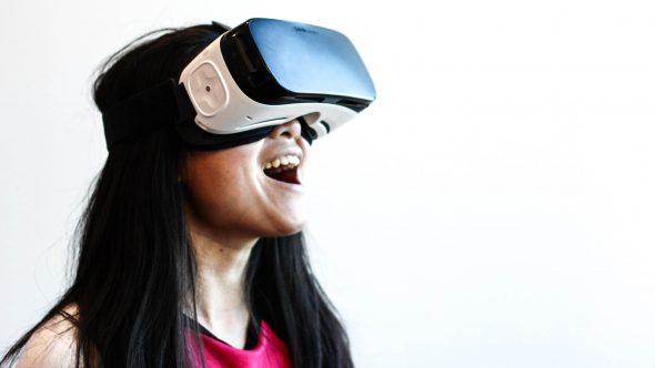 A lady wearing a VR headset