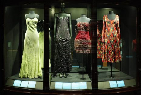 The sheer Versace day dress at far right (GH013642), on display in April 2001 alongside three other Versace dresses in Te Papa's collection.