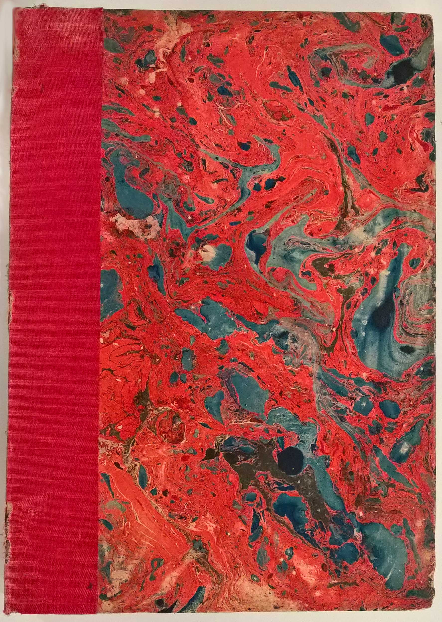 Bright red marble covered book