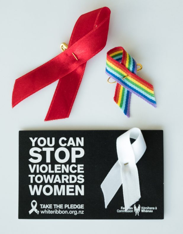 Red ribbon from World AIDS Day (held annually on 1 December); Rainbow Youth ribbon from this year’s Pride Week; and a white ribbon, about 2013. The White Ribbon campaign is held annually on 25 November. Personal collection of Stephanie Gibson.