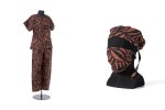 Doctors scrubs made of material featuring highly decorative Polynesian motifs in brown and black